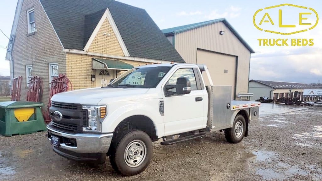 photo of a white pickup truck with a new truck bed from ALE Truck Beds