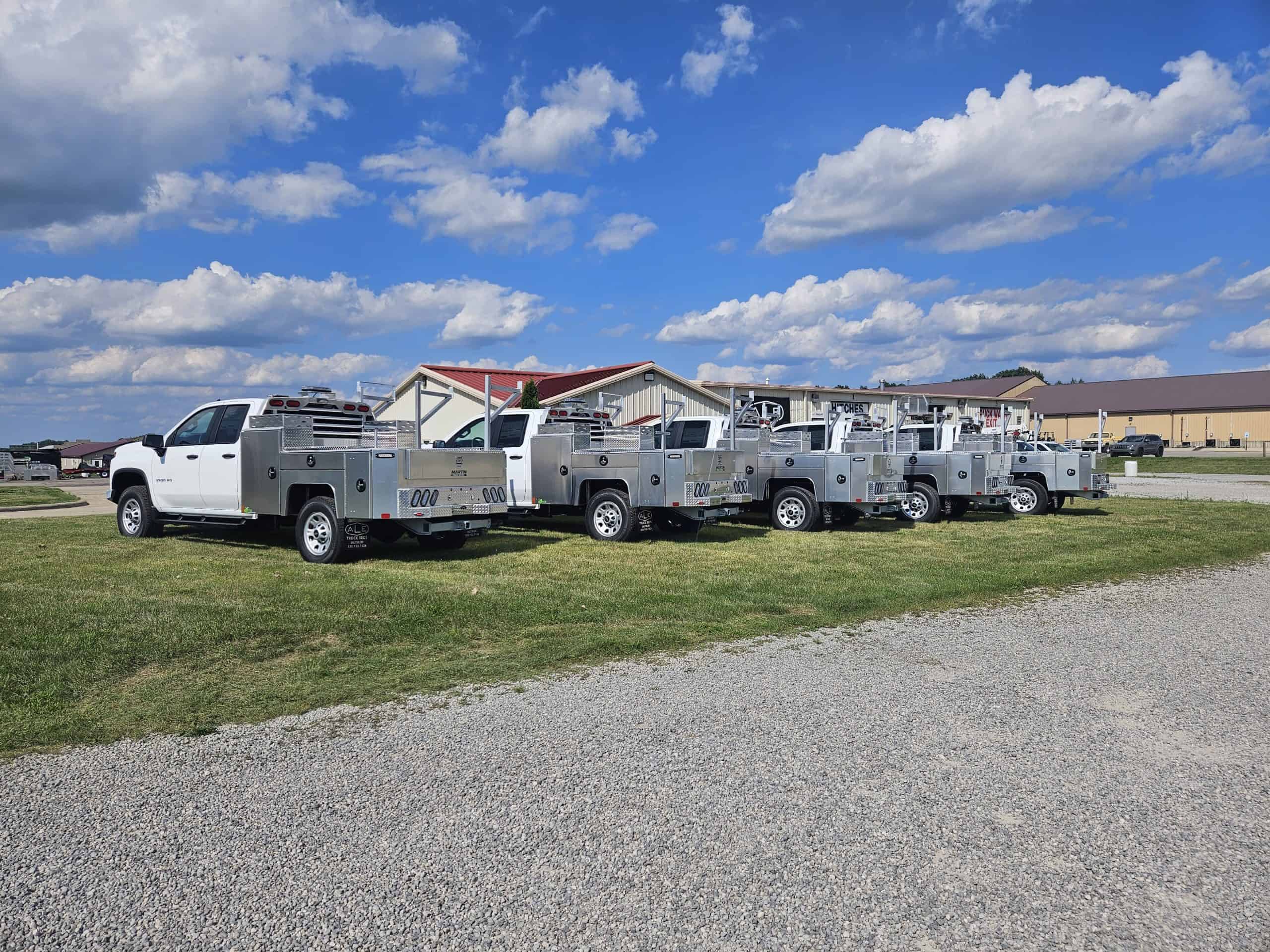 Fleet of aluminum flatbed service trucks upfitted by ALE Truck Beds in Dalton, Ohio