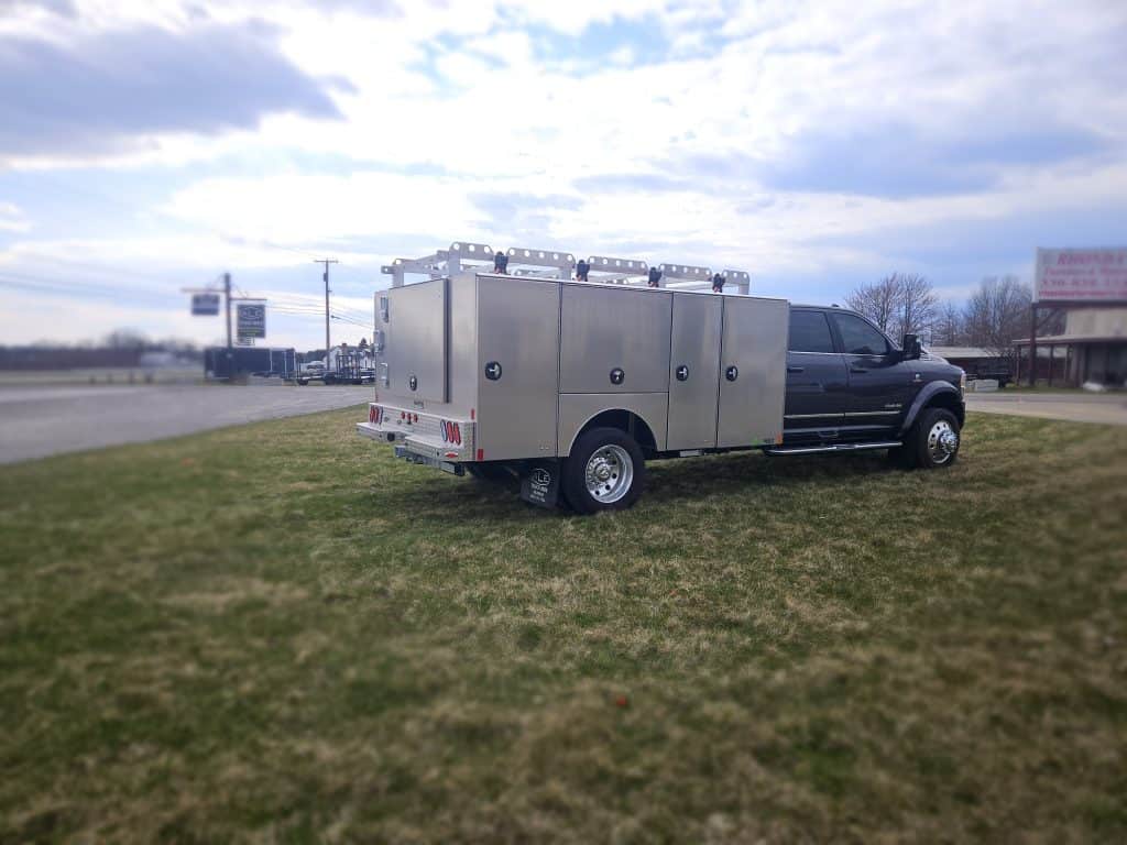 Side view of RAM truck with custom HSB service body from Martin Truck Bodies, installed by truck bed installers Ohio.