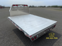 Martin Truck Bodies aluminum flatbed with square front corners, installed by ALE Truck Beds, featuring stake pockets, reflective tape, and LED tail lights – Dalton, Ohio – call 330-933-7526